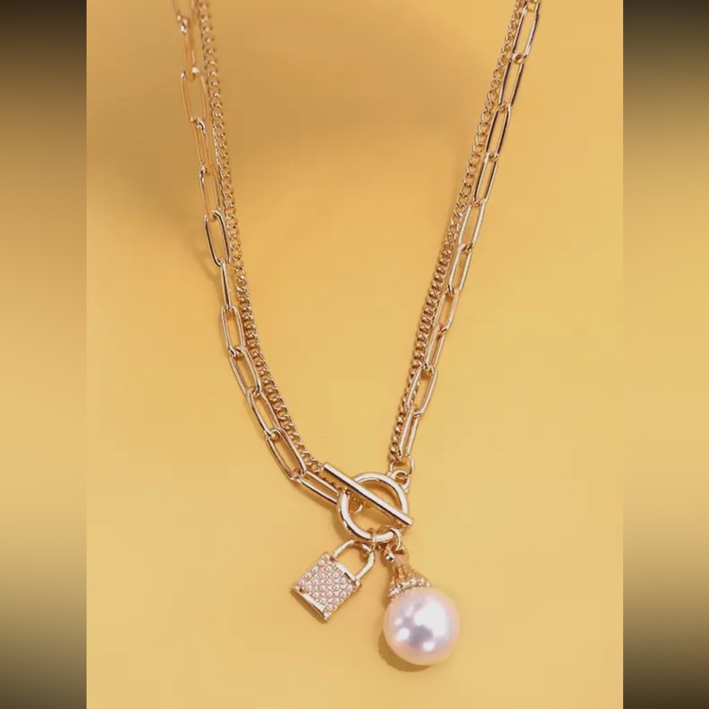 Elegant Gold Necklace with Pearl and Lock Charm